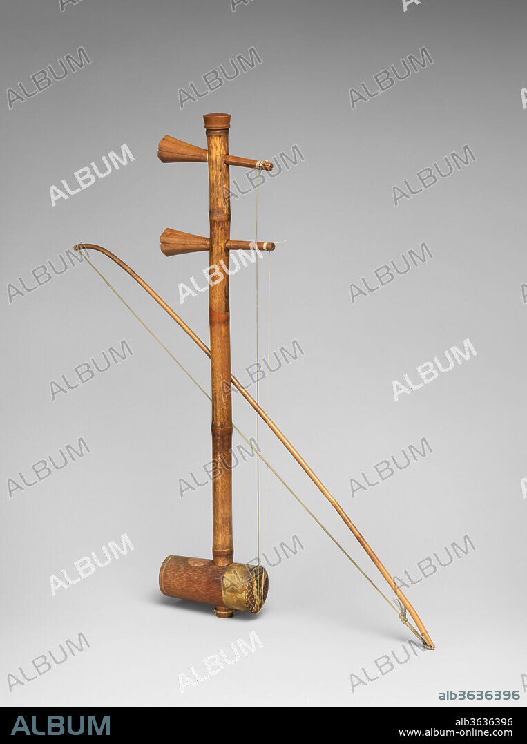 Jinghu (??). Culture: Japanese/Chinese. Dimensions: 20 1/2 × 1 7/8 × 5 1/16 in. (52.1 × 4.8 × 12.8 cm)
Length (Of bow): 21 15/16 in. (55.8 cm). Maker: Shinsai, "Katsu" Tajima (Japanese, active 1877-1888). Date: 19th century.
Synonymous with the Chinese term huqin until the 19th century, this instrument, used to accompany male roles, is the main melodic instrument of the opera.