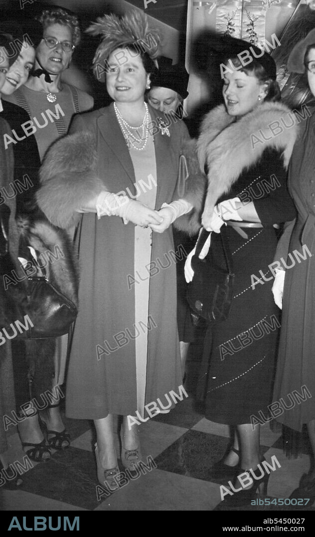 Informal Visit of The Queen to The Victoria League -- Her Majesty the Queen with Miss New Zealand (Miss Bobbie Woodward) wearing furs at the Victoria League, today.Her Majesty the Queen paid an informal visit to the Victoria League, Chesham Place London, today Tuesday, and recited a gift of blankets on behalf of New Zealand, from Lady Worsley. Her Majesty also met Miss New Zealand (Miss Bobbie Woodward). November 01, 1949. (Photo by Fox Photo).