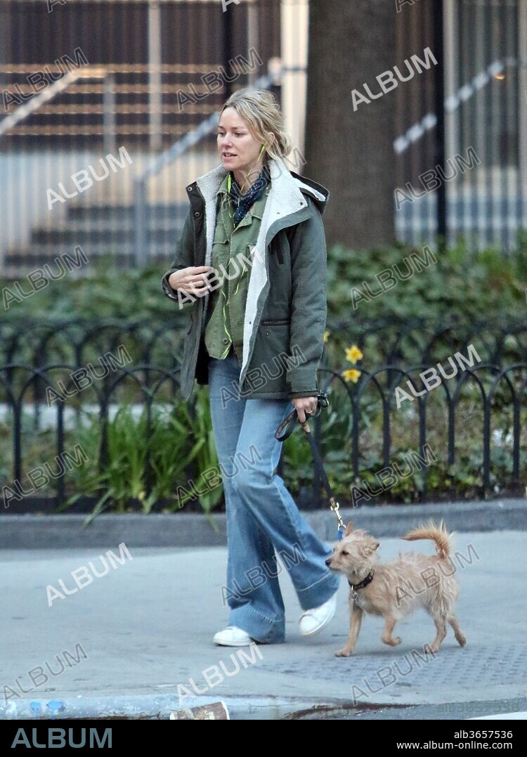 April 23, 2018 - New York, New York, United States - Actress Naomi Watts chats on her cellphone as she walks her dog in Tribeca on April23 2018 in New York City. 23/04/2018