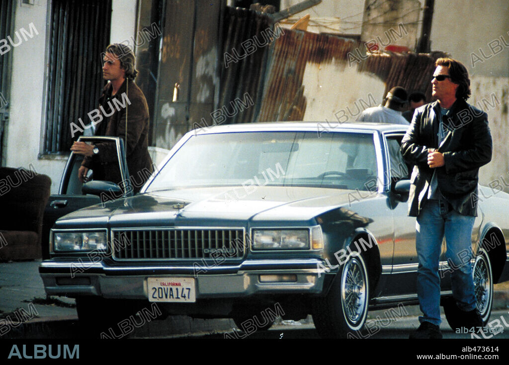 KURT RUSSELL and SCOTT SPEEDMAN in DARK BLUE, 2002, directed by RON SHELTON. Copyright UNITED ARTISTS / ZUCKERMAN, ROBERT.