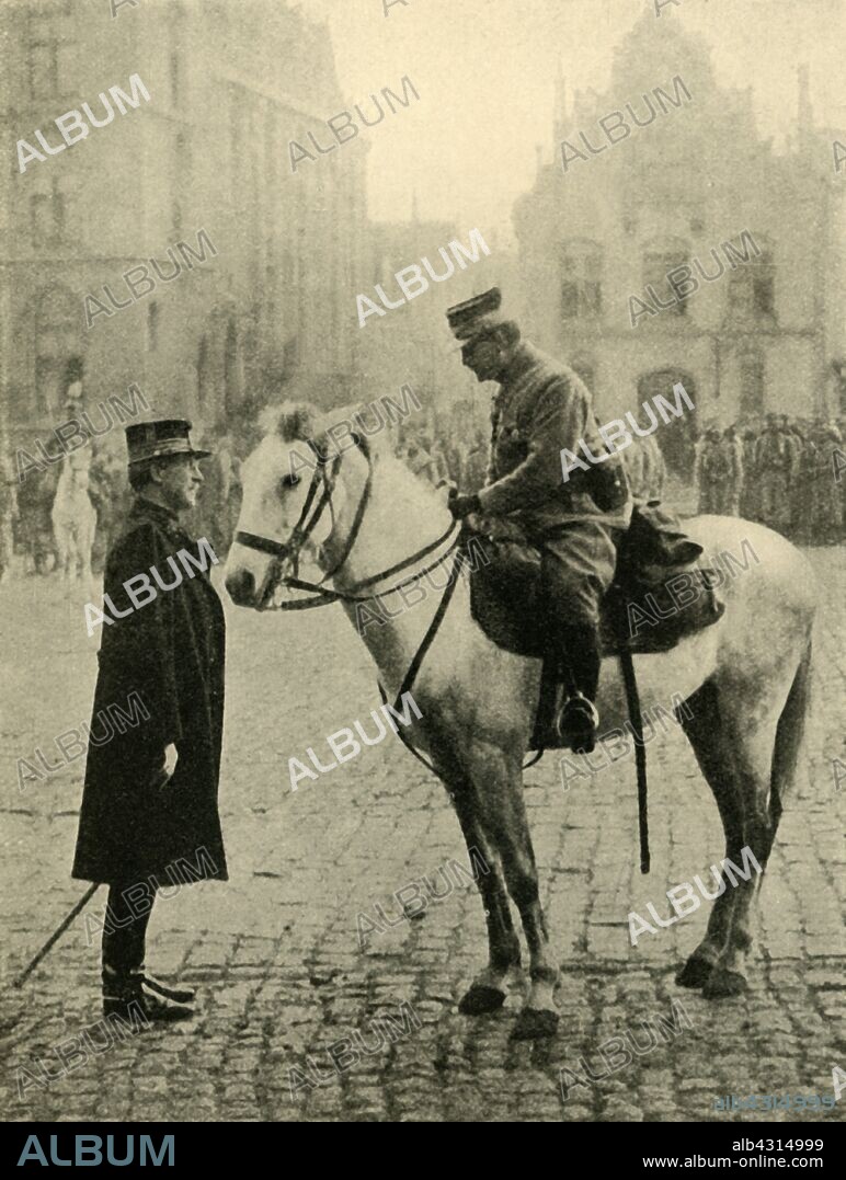Albert I of Belgium, First World War, 1914, (c1920). 'Still defending Belgian soil: King Albert [left] issuing instructions at the Head-quarters of his heroic army'. From "The Great World War - A History" Volume II, edited by Frank A Mumby. [The Gresham Publishing Company Ltd, London, c1920].