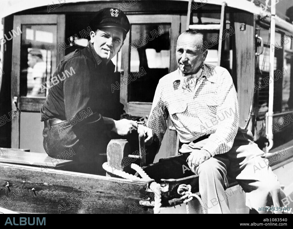 JOHN GARFIELD and MICHAEL CURTIZ in THE BREAKING POINT, 1950, directed by MICHAEL CURTIZ. Copyright WARNER BROTHERS.