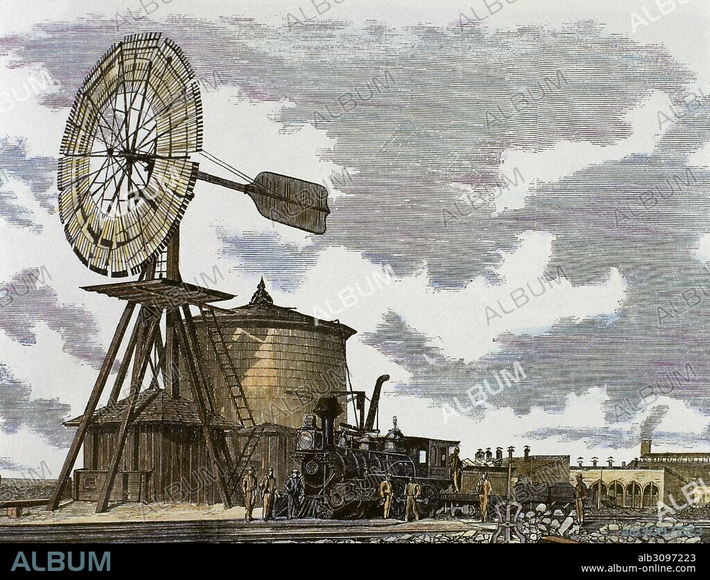 HISTORIA DEL OESTE AMERICANO. SIGLO XIX. Estación del ferrocarril en Laramie, en el Territorio Wyoming. Existía un gran depósito de agua y un molino de viento para rellenar los depósitos de las locomotoras. Año 1869. Grabado coloreado.