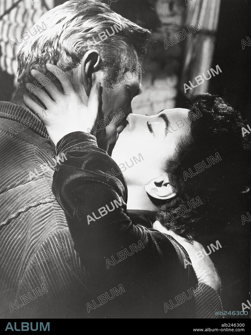 JOAN CRAWFORD and STERLING HAYDEN in JOHNNY GUITAR, 1954, directed by NICHOLAS RAY. Copyright REPUBLIC PICTURES.