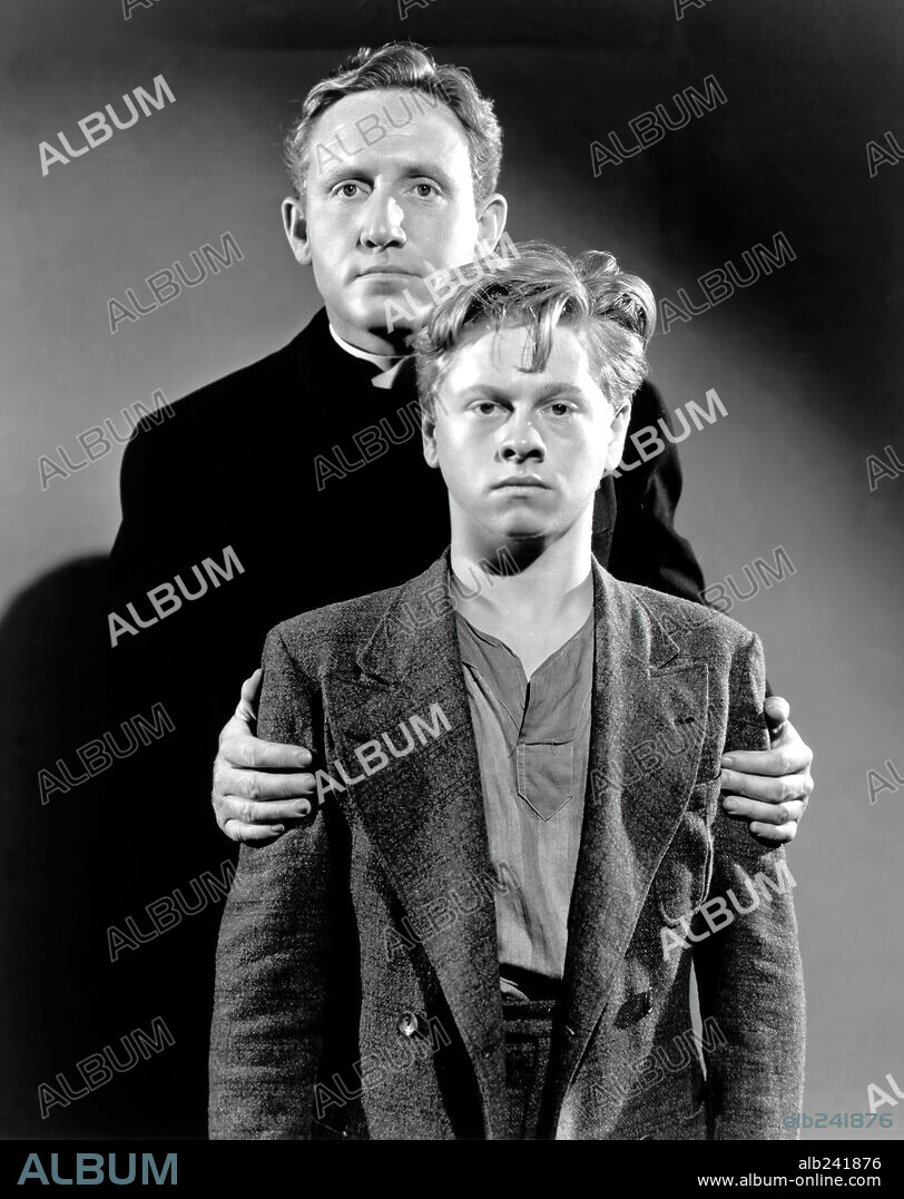 MICKEY ROONEY and SPENCER TRACY in BOYS TOWN, 1938, directed by NORMAN TAUROG. Copyright M.G.M.