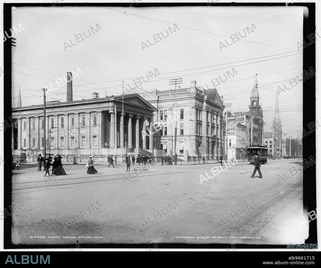 Court house, Dayton, Ohio, c1902. The Montgomery County Courthouse (on left) was designed in Greek Revival style by Howard Daniels and built in 1847. The limestone building, also known as the Old Courthouse, was modelled on the 5th century BC Temple of Hephaestus in Athens, Greece. In 1881-1884, a new, larger county courthouse was built beside the original building. The two were connected by a hallway,.