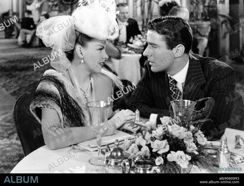 JUDY GARLAND and PETER LAWFORD in EASTER PARADE, 1948, directed by CHARLES WALTERS. Copyright M.G.M.