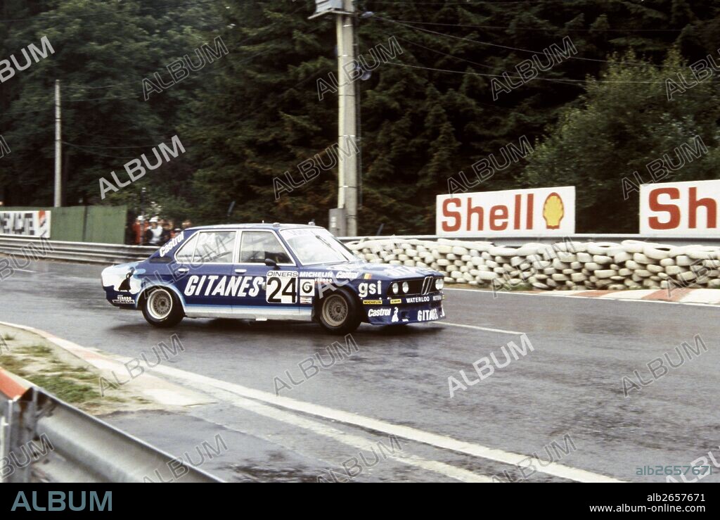 Jean-Louis Trintignant-Marianne Hoepfner-Alain Cudini-Derek Bell's BMW 530i at La Source hairpin, Spa-Francorchamps 24 Hours, Belgium, 26-27 July 1981.
