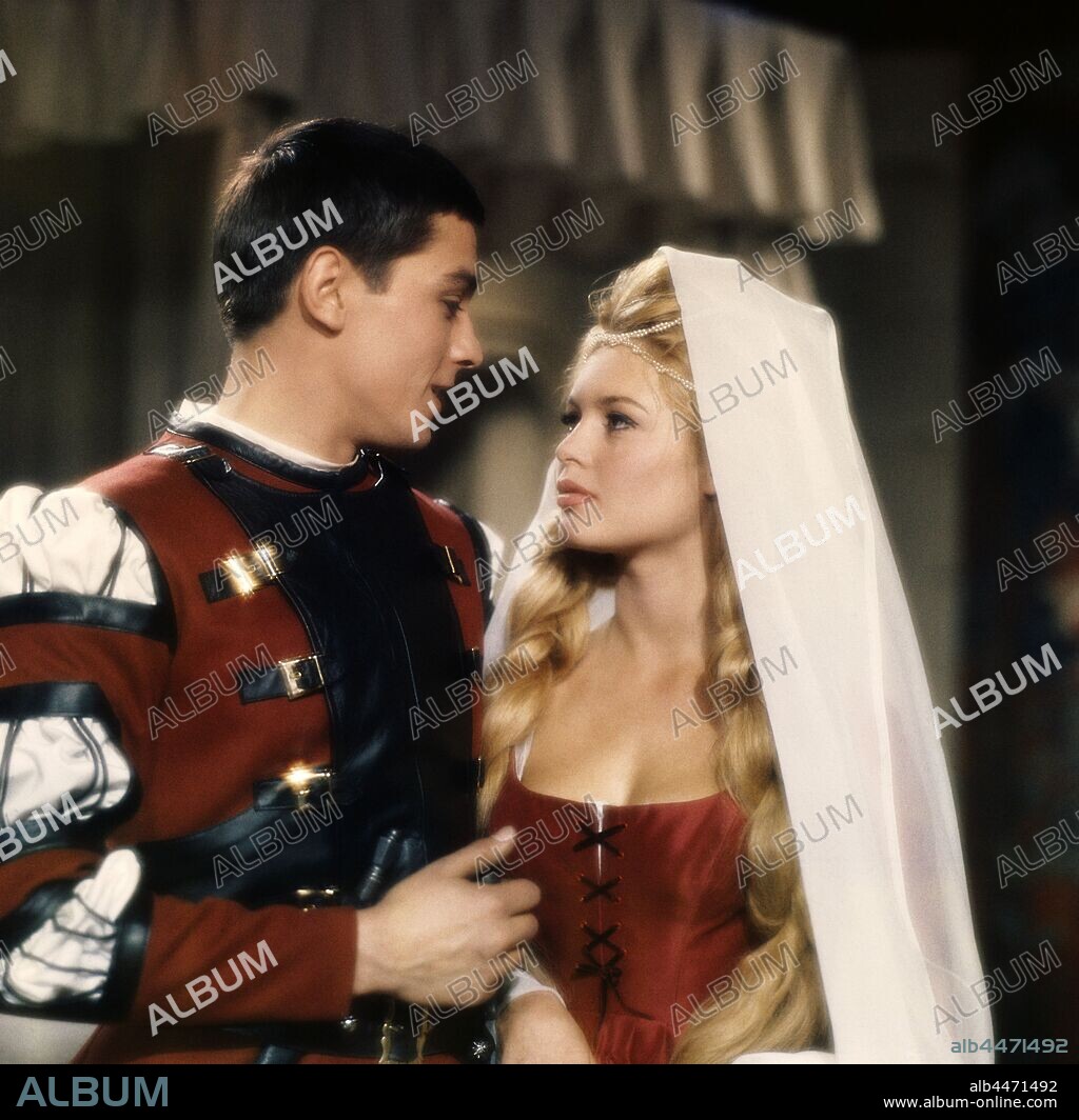 ALAIN DELON and BRIGITTE BARDOT in FAMOUS LOVE AFFAIRS, 1961 (LES AMOURS CELEBRES), directed by MICHEL BOISROND. Copyright GENERALE EUROPEENNE DE FILMS.
