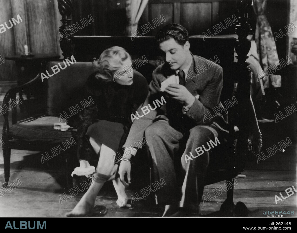 MADELEINE CARROLL and PETER DONAT in THE 39 STEPS, 1935, directed by ALFRED HITCHCOCK. Copyright GAUMONT-BRITISH.