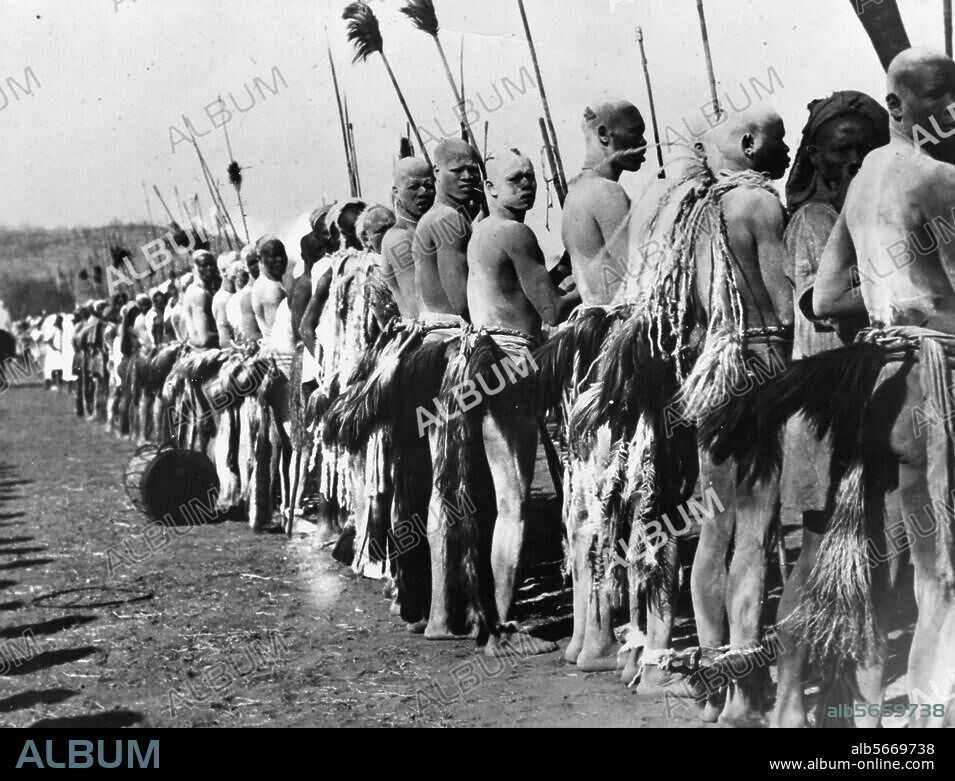 Ethnology / Africa. Men of the Kadugli tribe at the Sudan wearing festive outfits. Photo, 1937.