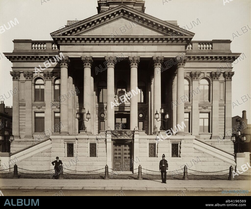 Birkenhead Town Hall, Hamilton Square, Birkenhead, Merseyside, 1888. Exterior of Birkenhead Town Hall showing the portico. A policeman and bystander look towards the camera. Designed by Christopher Ellison, the building was completed in 1887.