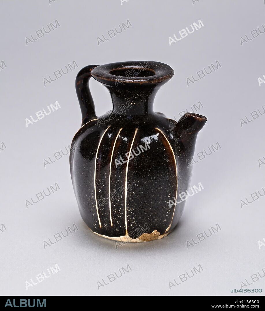 Handled Ewer with Vertical Ribs. China. Date: 1100-1299. Dimensions: H. 7.0 cm (2 13/16 in.); diam. 6.3 cm (2 1/2 in.). Northern blackware, Cizhou type; light grey stoneware with white trailed slip under dark brown glaze. Origin: China.