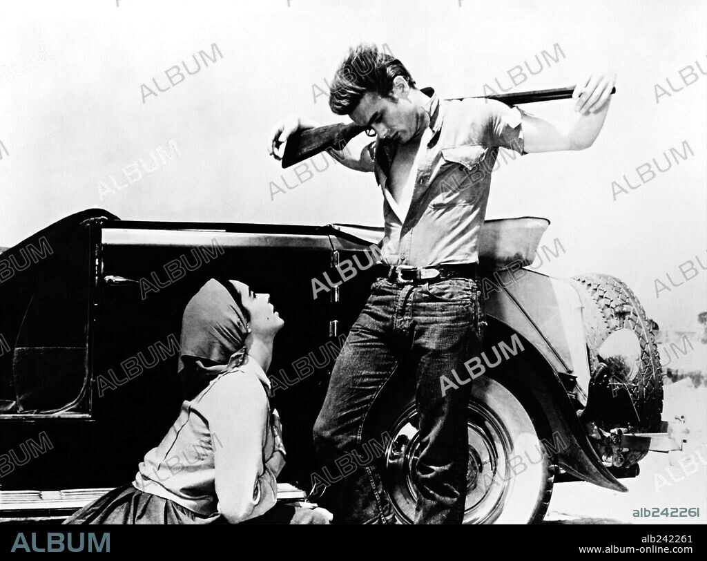 ELIZABETH TAYLOR y JAMES DEAN en GIGANTE, 1956 (GIANT), dirigida por GEORGE STEVENS. Copyright WARNER BROTHERS.