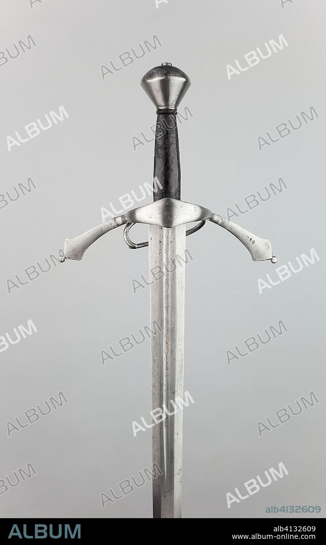 Sword from the Armory of Schloss Ambras, Innsbruck. Hilt: German or possibly Austrian (Innsbruck); Blade: German, Passau. Date: 1560-1600. Dimensions: Overall L. 114 cm (44 7/8 in.)
Blade L. 97.8 cm (38 1/2 in.)
Wt. 3 lb. 5 oz. Steel, brass, wood, and leather. Origin: Germany.
