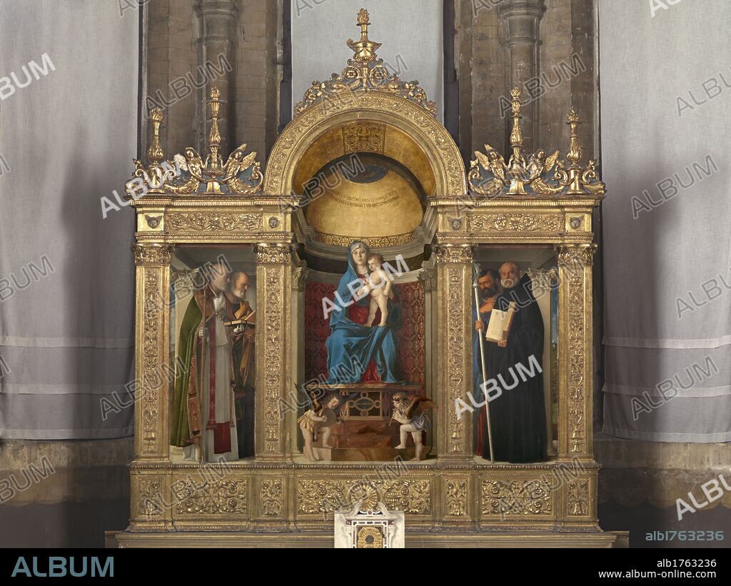 Frari Triptych, by Giovanni Bellini, 1485-1488 about, 15th Century, panel, cm 184 x 79. Italy, Veneto, Venice, Santa Maria Gloriosa dei Frari Basilica, sacristy. Whole artwork view. Gold frame niche Madonna Virgin Mary Baby Child Jesus throne podium saints cherubs putti.