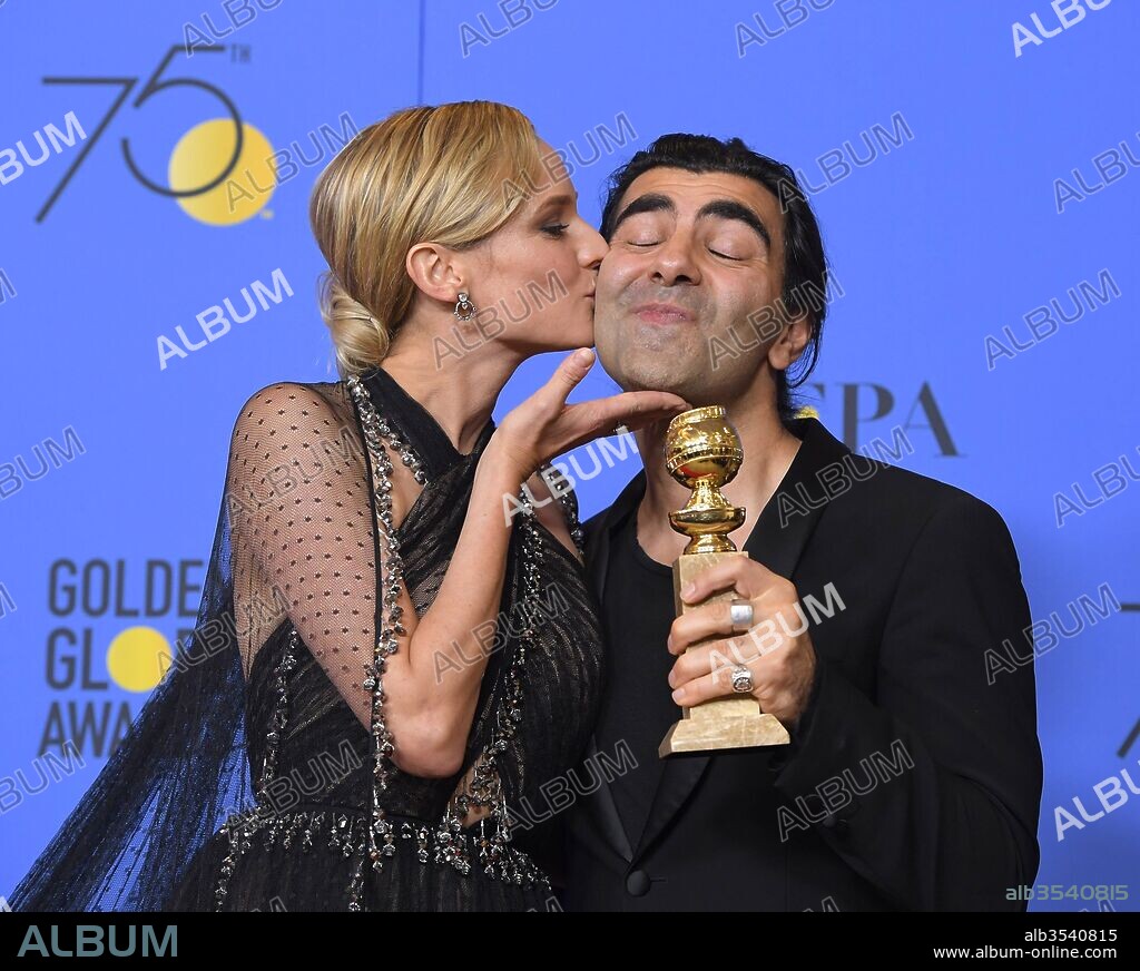 January 7, 2018 - Beverly Hills, California, U.S. - German actress DIANE KRUGER kisses German director FATIH AKIN whose 'In The Fade' won the Golden Globe for Best Foreign Language Film, in the Press Room during the 75th Annual Golden Globe Awards, at The Beverly Hilton Hotel. 07/01/2018