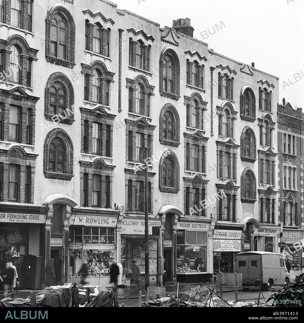 Albemarle Mansions, Holloway Road, Holloway, London, 1962-1964. An exterior view of the street frontage of Albemarle Mansions and the shops below at Nos 544 to 554 Holloway Road, Islington.