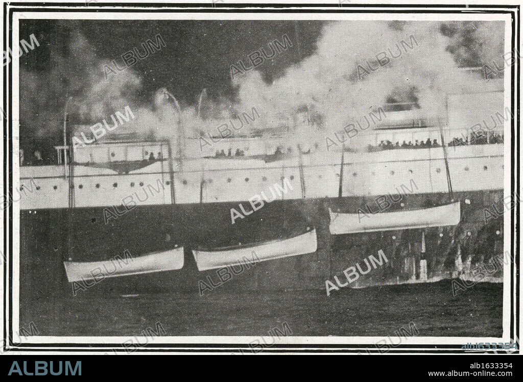 Titanic Survivors. How the Titanic Survivors Were Picked up by the Carpathia. Photograph taken by Mr J W Barker of three of the Titanic's lifeboats hanging from the side of the Carpathia. Carpathia was sailing from New York City to Rijeka on the night of Sunday, 14 April 1912. The captain, Arthur Henry Rostron, was asleep in his cabin when wireless operator Harold Cottam burst in and told him of Titanic's distress signal. Captain Rostron immediately set course to the liner's last known position, over 60 miles away. At 4 o'clock in the morning Carpathia arrived at the scene after working her way through dangerous ice fields and was able to save 705 people. Titanic was built by Harland & Wolff in Belfast Ireland during 1910 - 1911 and sank on April 15th, 1912 after striking an iceberg off the coast of New Foundland during her maiden voyage from Southampton, England to New York, USA, with the loss of 1,522 passengers and crew. (Photo by Titanic Images/Universal Images Group).