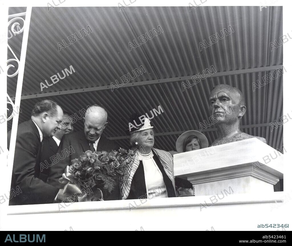 Marshall Space Flight Center dedication, USA, September 8, 1960. President Dwight D. Eisenhower and Katherine Tupper Marshall unveil the bronze bust of her husband General George C. Marshall during the dedication ceremony of the Marshall Space Flight Center (MSFC) in Huntsville, Alabama. On October 21, 1959, President Eisenhower directed the transfer of personnel from the Redstone Arsenal's Army Ballistic Missile Agency Development Operations Division to the National Aeronautics and Space Administration (NASA). A new field installation of NASA was designated as George C. Marshall Space Flight Center (MSFC), and its complex was formed within the boundaries of Redstone Arsenal in Huntsville, Alabama. MSFC began its operation on July 1, 1960 after the transfer ceremony, with Dr. Wernher von Braun as Center Director.