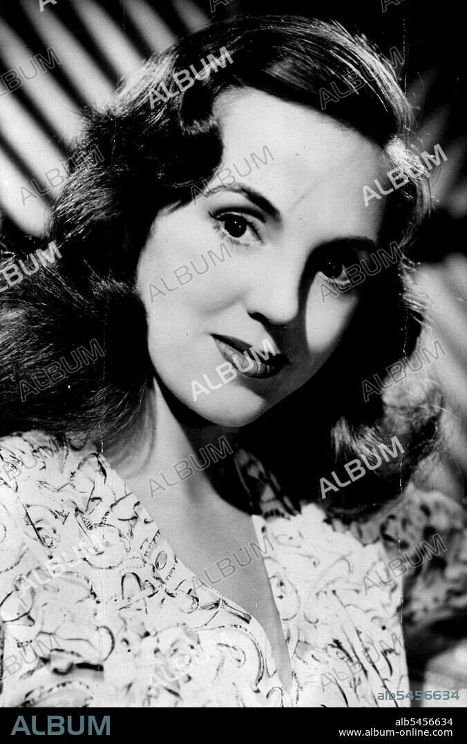 Carol Raye "Sent up" the airlines war with a parody on a hit tune that substituted. "Canberra" for "Camelot," a rather bumpy, rhythmical road.Modren Miss. For her role in a new English Production, Carol Raye, who plays the part of a newspaper woman, has to take up smoking, learn to type and play the piano. The film will be called "While I Live." July 16, 1947. (Photo by Reuterphoto).