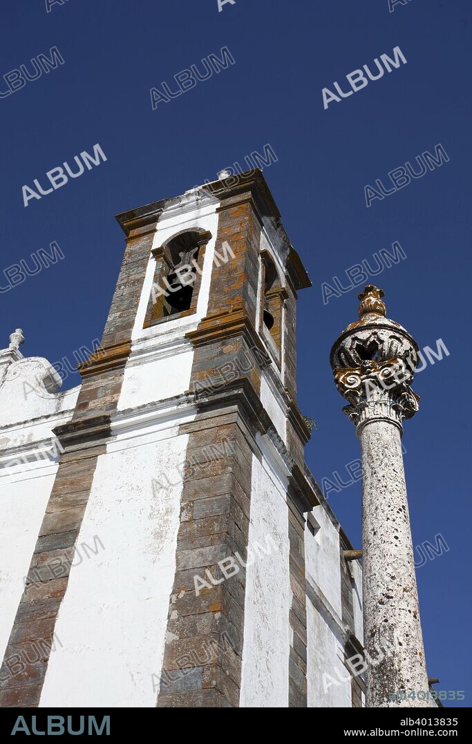 The bell tower of the parish church of Monsaraz, Portugal, 2009. This Gothic church dates from the 17th century. Monsaraz is a small fortified medieval village that on stands on a hill overlooking the Guadiana River, a few miles from neighbouring Spain.