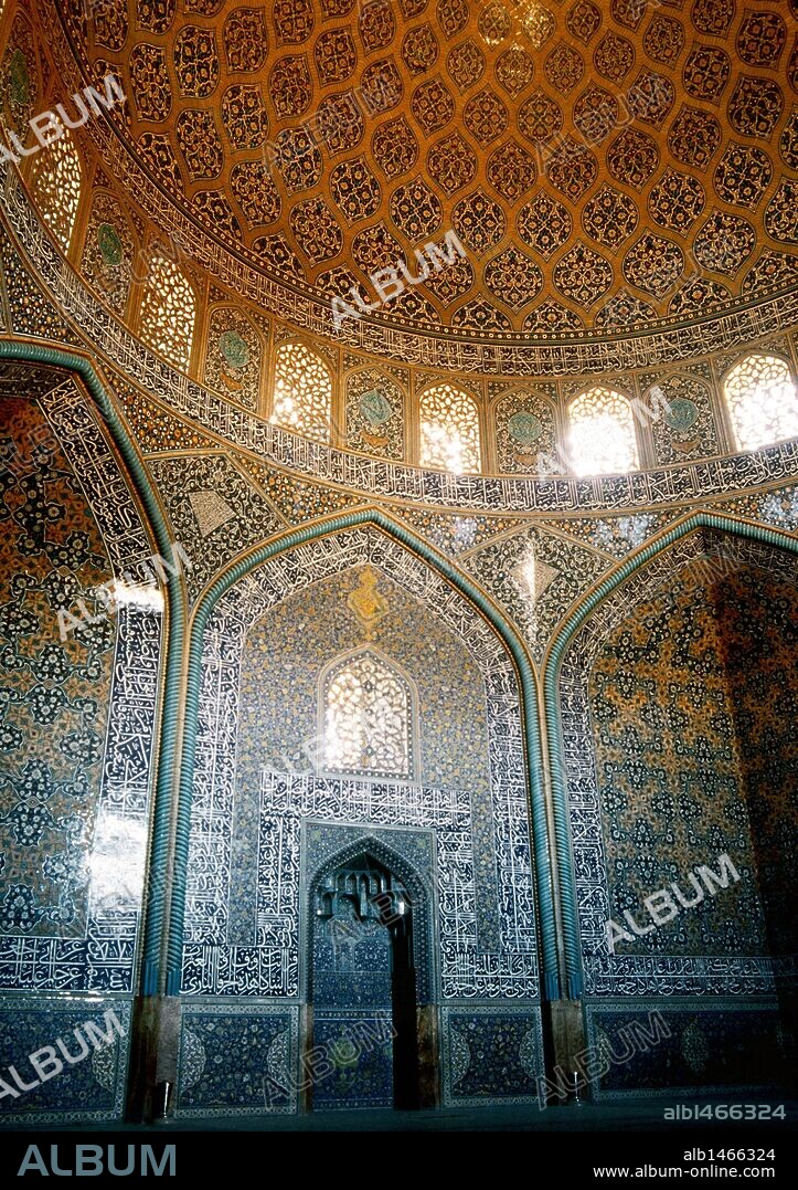 Islamic Art. Safavid era. Sheikh Lotf Allah Mosque. Built in 1598 during the reign of Abbas I and completed in 1602 in time of Sheikh Lotfollah. Mirhab and dome of the prayer hall covered with glazed tiles and writing of Ali Reza Abbasi. Isfahan. Islamic Republic of Iran.