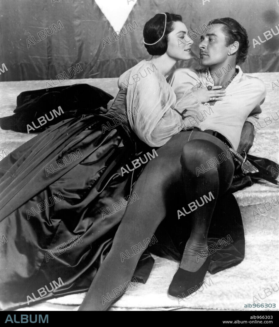 ERROL FLYNN and VIVECA LINDFORS in THE ADVENTURES OF DON JUAN, 1948, directed by VINCENT SHERMAN. Copyright WARNER BROS/FIRST NATIONAL.