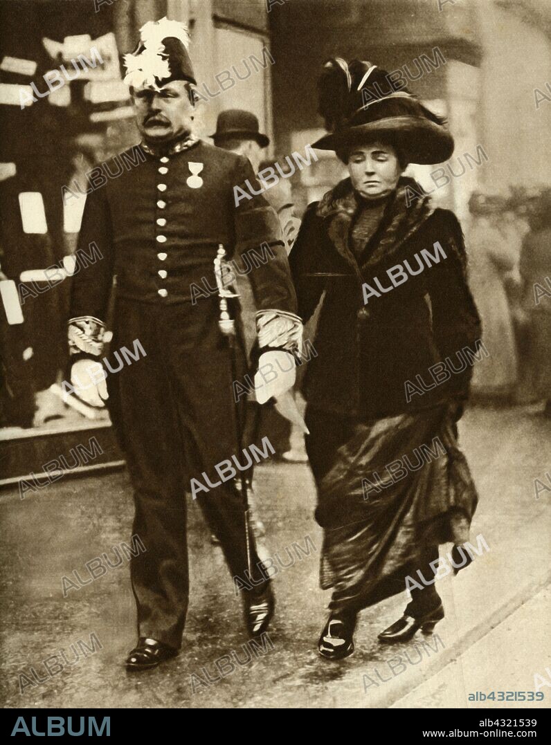 David Lloyd George and his wife Margaret, 1910, (1935). British Chancellor of the Exchequer David Lloyd George (1863-1945), and his wife Margaret Lloyd George (née Owen, 1864-1941). 'Mr. Lloyd George, seen here with his wife on the way to a Levee in 1910, was responsible for the National Health and Unemployment Insurance Scheme which created such excitement at this time'. From "The Silver Jubilee Book - The Story of 25 Eventful Years in Pictures". [Odhams Press Ltd., London, 1935].