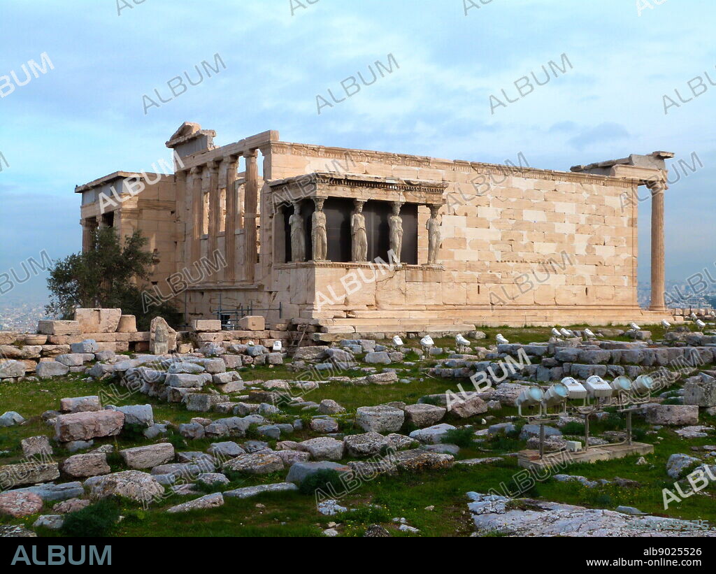 The Erechteon is an ancient Greek temple on the north side of the Acropolis of Athens in Greece. The temple was built between 421 and 405 BC. Its architect may have been Mnesicles, and it derived its name from a shrine dedicated to the legendary Greek hero Erichthonius. The sculptor and mason of the structure was Phidias, who was employed by Pericles to build both the Erechtheum and the Parthenon. It is believed to have been a replacement for the Peisistratid temple of Athena Polias destroyed by the Persians in 480 BC. The Porch of the Caryatids On the south side, there is another large porch with columns, and on the south, the famous 'Porch of the Maidens', with six draped female figures (caryatids) as supporting columns.