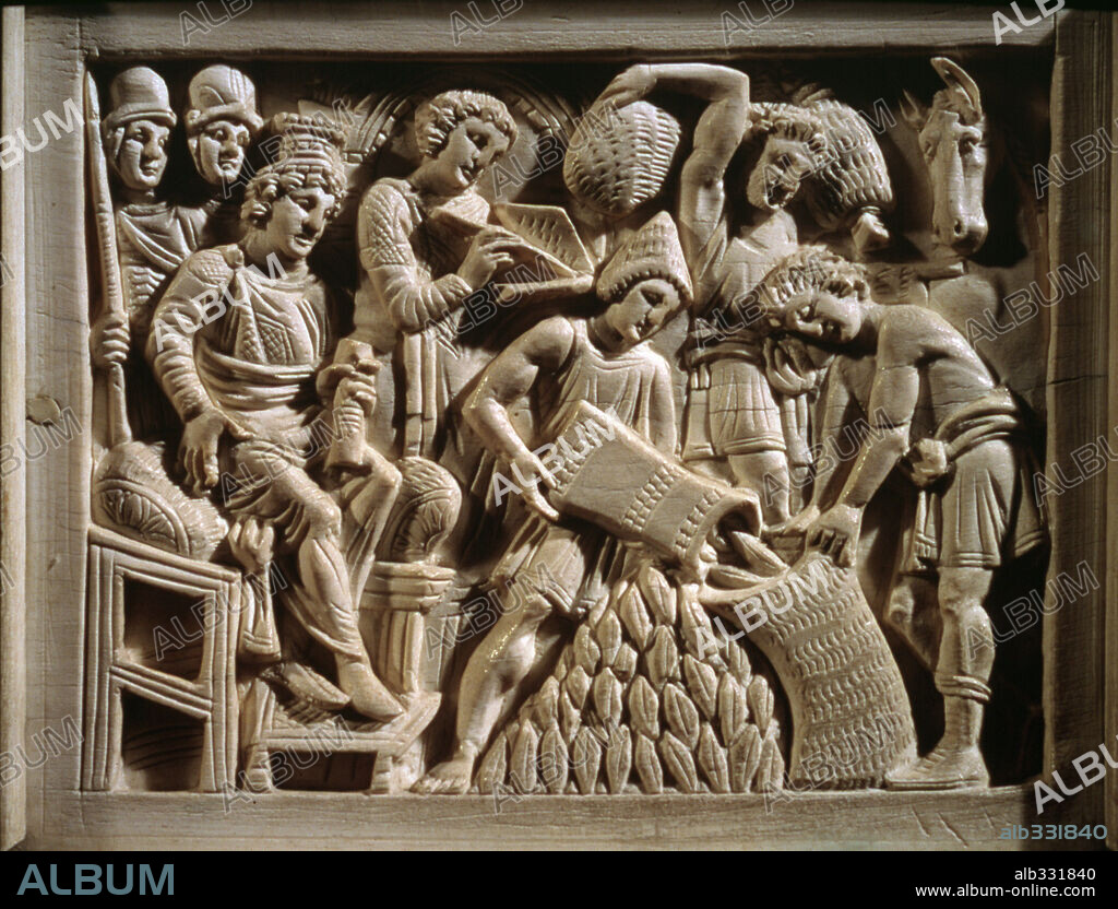 Joseph as ruler of Egypt wearing modiolon filling brothers sacks with grain on ivory chair of St. Maximian.