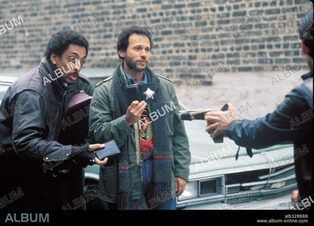 BILLY CRYSTAL and GREGORY HINES in RUNNING SCARED, 1986, directed by PETER HYAMS. Copyright M.G.M / VAUGHAN, STEPHEN.