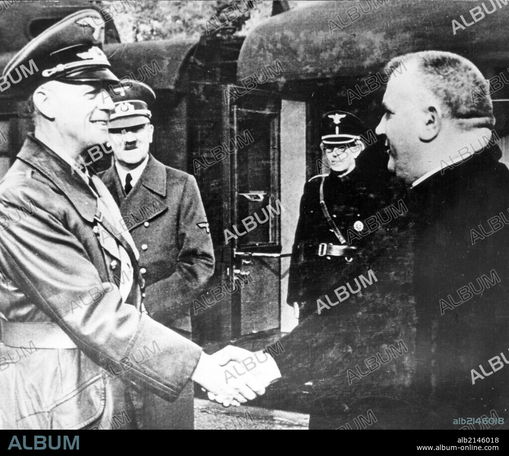 Jozef Tiso, Accompanied By Slovak Premier Vojtech Tuka (R) Is Being Greeted By German Foreign Minister Von Ribbentrop As The Two Slovak Politicians Arrive At Hitler'S Headquarters On October 6, 1941. (Photo by: Sovfoto/UIG via Getty Images).