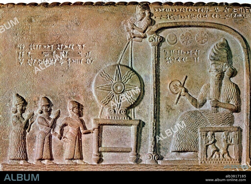 The Tablet of Shamash is a stone tablet recovered from the ancient Babylonian city of Sippar in southern Iraq in 1881. It is dated to the reign of King Nabu-apla-iddina circa 888-855 BC. The bas-relief on the top of the obverse shows Shamash, the Sun God, beneath symbols of the Sun, Moon and Venus. He is depicted in a seated position in a shrine, holding forward a measuring rod and reel of cord. There is another large sun disk in front of him on an altar, suspended from above by two figures. Of the three other figures on the left, the central one is dressed in the same fashion as Shamash and is assumed to be the Babylonian king Nabu-apla-iddina receiving the symbols of deity. The cuneiform text beneath the stele is divided into fifteen passages, blending prose, poetic and rhetorical elements in the fashion typical of Mesopotamian royal inscriptions. It tells how Sippar and the Ebabbar temple of Shamash had fallen into disrepair with the loss of the statue of the God. This cult image is temporarily replaced with the solar disk; it is further described how a new figure of Shamash was found in an eastern part of the Euphrates, from which Nabu-apla-iddina has constructed a new statue of lapis lazuli and gold to restore the cult.