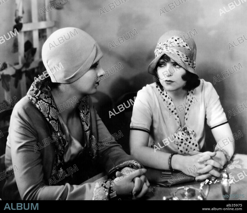 CLARA BOW and KAY FRANCIS in DANGEROUS CURVES, 1929, directed by LOTHAR MENDES. Copyright PARAMOUNT PICTURES.