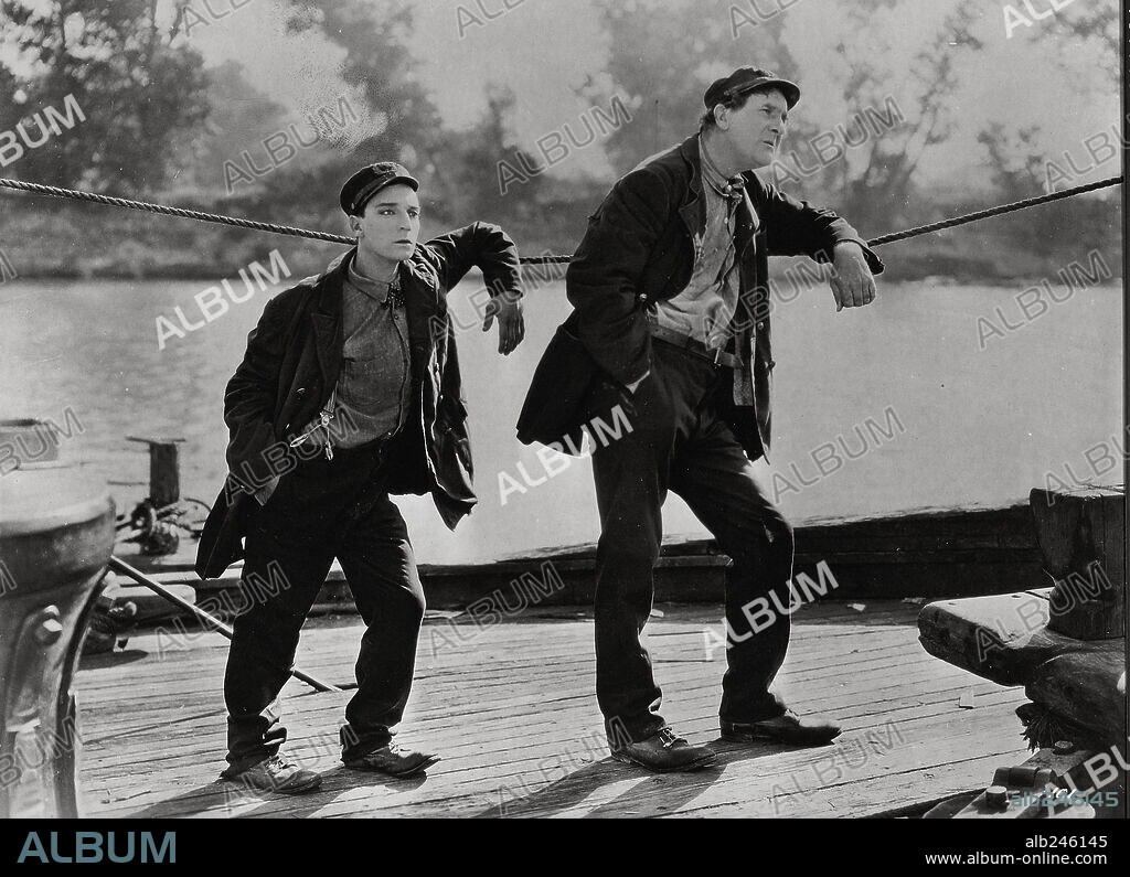 BUSTER KEATON and ERNEST TORRENCE in STEAMBOAT BILL JR., 1928, directed by CHARLES REISNER. Copyright UNITED ARTISTS.