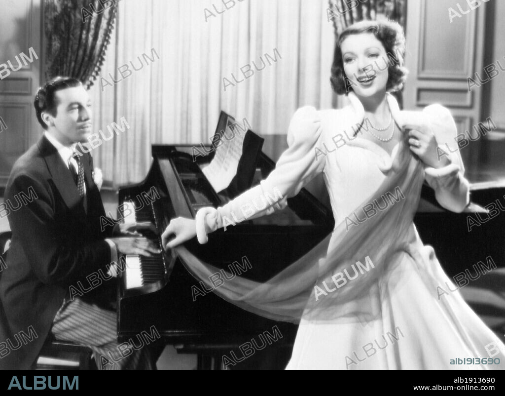 LORETTA YOUNG and WARNER BAXTER in WIFE, HUSBAND AND FRIEND, 1939, directed by GREGORY RATOFF. Copyright 20TH CENTURY FOX.