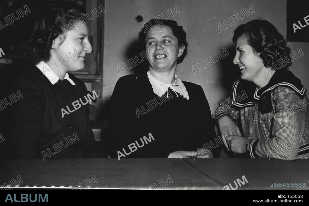 Survivors Of Massacre Of Lidice Testify At Nuremberg Trail -- (Left to right) Marie Hanfova; Ruzzna Petrakova and Marie Dolezalova, three survivors of the massacre of Lidice are seen in the court room at Nuremberg Oct. 30. Where they related which erased an entire village because Reinhard Heydrich, chief of the German Gestapo, was assassinated in occupied Czechoslovakia in 1942.  Defendants in the case are charged with the responsibility for kidnapping of foreign children to have them raised as Nazis, and other crimes. December 23, 1947. (Photo by Associated Press Photo).