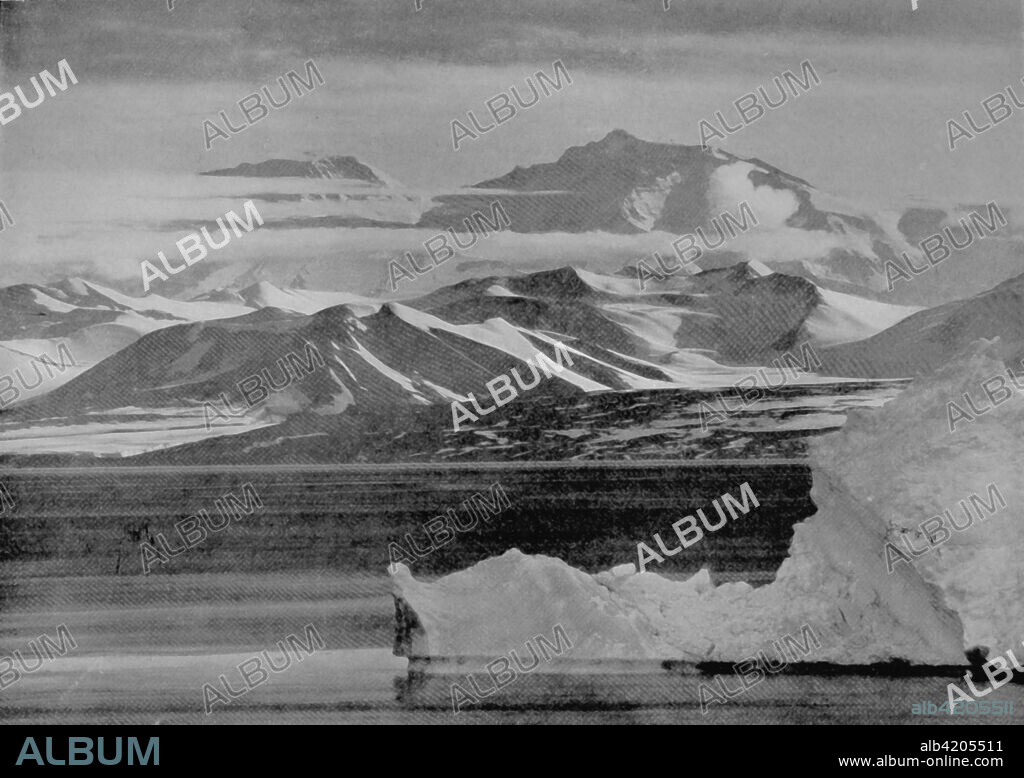 'Telephotograph of the Mount Lister Scarp, 13,000 Feet High, Showing The Cwm Valleys (Taken from Cape Evans, 60 miles to the East)', 10 February 1911, (1913). The final expedition of British Antarctic explorer Captain Robert Falcon Scott (1868-1912) left London on 1 June 1910 bound for the South Pole. The Terra Nova Expedition, officially the British Antarctic Expedition (1910-1913), included a geologist, a zoologist, a surgeon, a photographer, an engineer, a ski expert, a meteorologist and a physicist among others. Scott wished to continue the scientific work that he had begun when leading the Discovery Expedition to the Antarctic in 1901-04. He also wanted to be the first to reach the geographic South Pole. Scott, accompanied by Dr Edward Wilson, Captain Lawrence Oates, Lieutenant Henry Bowers and Petty Officer Edgar Evans, reached the Pole on 17 January 1912, only to find that the Norwegian expedition under Amundsen had beaten them to their objective by a month. Delayed by blizzards, and running out of supplies, Scott and the remainder of his team died at the end of March. Their bodies and diaries were found eight months later. From Scott's Last Expedition, Volume II. [Smith, Elder & Co., London, 1913].