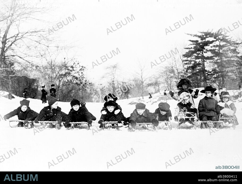 Children with sleds in Central Park, NYC. Central Park is a public park at the center of Manhattan in New York City. The park opened in 1857, on 843 acres of city-owned land. In 1858, Frederick Law Olmsted and Calvert Vaux won a design competition to improve and expand the park with a plan they entitled the Greensward Plan. Construction began the same year, continued during the American Civil War, and was completed in 1873. Photographed by Bain News Service, 1915.