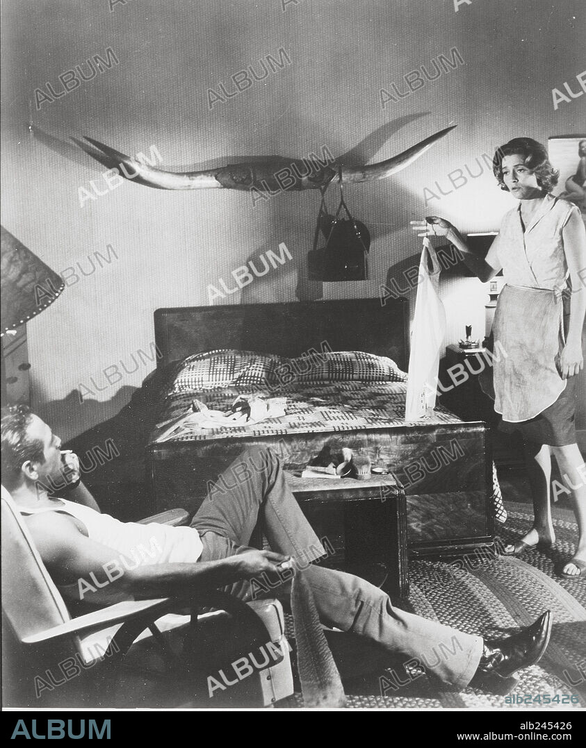 PATRICIA NEAL and PAUL NEWMAN in HUD, 1963, directed by MARTIN RITT. Copyright PARAMOUNT PICTURES.