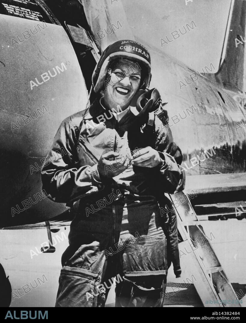 Breaks Two World Records - Speed flyer Jacqueline Cochran stands in front of the Canadian-built F-86 Sabre jet in which she has broken two World records at Edwards Air Force Base by flying around a 12 pylon course at an average 652.337 miles per hour, the army announced today. She shattered the women's jet speed record of 535 mph held by Mme. Jacqueline Auriol of France, and the all-time jet record for 100½,kilometer course, made by Col.Fred Ascani, U.S. Air force of 635 mph. Jacqueline Cochran poses in front of the Canadian-built F-86 Sabre jet in which she broke two world speed records, shattering the all-time record of 535 mph set by her French rival. May 18, 1953. (Photo by AP Wirephoto).