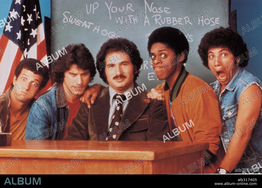 GABE KAPLAN, JOHN TRAVOLTA, LAWRENCE HILTON-JACOBS, ROBERT HEGYES and RON PALILLO in "KOTTER"-TV, 1975 (WELCOME BACK, KOTTER-TV), directed by ALAN SACKS and GABE KAPLAN. Copyright THE KOMACK COMPANY/WOLPER PRODUCTIONS.