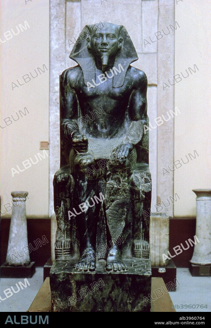 Diorite statue of the Ancient Egyptian pharaoh Khafre, 26th century BC. The fourth pharaoh of the Fourth Dynasty, Khafre (Chephren) was the builder of the second of the Great Pyramids of Giza. It is believed that his is the face on the Great Sphinx that also stands on th plateau of Giza.