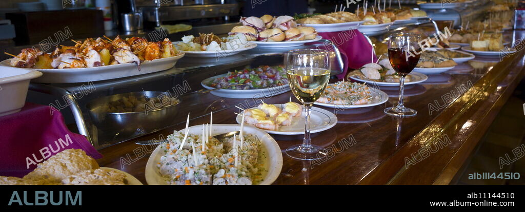Tapas raciones in Taberna La Cierbanata bar in tourist resort of Castro Urdiales in Cantabria, Spain.
