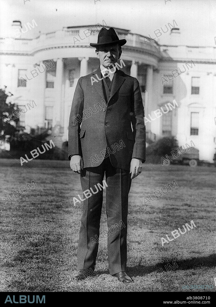 President Coolidge standing on south lawn of White House, February 26, 1925. John Calvin Coolidge, Jr. (July 4, 1872 - January 5, 1933) was the 30th President of the US (1923-29). A Republican lawyer from Vermont, Coolidge worked his way up the ladder of Massachusetts state politics, and eventually became governor. He was elected as the 29th Vice President in 1920 and succeeded to the Presidency upon the sudden death of Harding in 1923. Elected in his own right in 1924, he gained a reputation as a small-government conservative, and as a man who said very little. Coolidge restored public confidence in the White House after the scandals of his predecessor's administration, and left office with considerable popularity. His reputation underwent a renaissance during the Ronald Reagan administration, but the ultimate assessment of his presidency is still divided between those who approve of his reduction of the size of government programs and those who believe the federal government should be more involved in regulating and controlling the economy. He died suddenly from coronary thrombosis in 1933 at the age of 60. Shortly before his death, Coolidge confided to an old friend: "I feel I no longer fit in with these times." National Photo Company Collection.