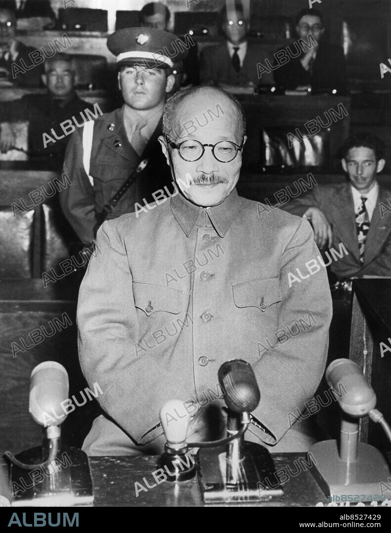 Orig. bildtext... IT ISN'T FUNNY - TOJO Tokyo, Japan. Hideki Tojo, former japanese general and premier and war minister during the war, smirks as he takes the stand, in his own behalf during the International tribunal trials here in Tokyo. The defense phase of the trial is taking place now. It won't be funny when he hears the verdict. Anm. H Tojo, 1884-1948, japansk militär och politiker, premiärminister 1941-1944. Efter Japans kapitulation dömdes han 1948 till döden för krigsförbrytelser och avrättades. CD119 persons: Hideki Tojo sites: JAPAN ;TOKYO.