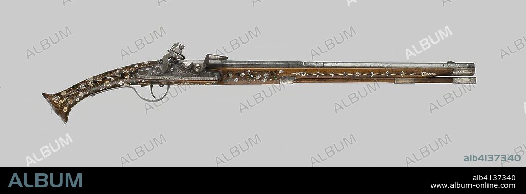 Flintlock Pistol. French, Alsace. Date: 1640-1650. Dimensions: L. 80 cm (31 1/2 in.) 
Barrel L. 45.6 cm (17 5/16 in.) 
Wt. 3 lb. 2 oz. 
Caliber .50. Steel, silver, brass, wood, mother-of-pearl, and horn. Origin: Alsace.