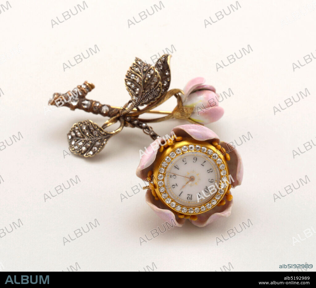 Lapel watch, Paulding Farnham, American, b. 1859, Gold, enamel, diamonds, Chatelaine watch forms the core of a wild rose, the stem and foliage of which are composed of enameled gold, studded with diamonds., - Bar pin with three leaves, encrusted with small rose diamonds., - Branch set with large rose diamonds., - Pink enamel bud (few chips on edge)., - Pendant watch, pink enamel hung from small rose diamond chain., - Five pink enamel petals, old mine diamond clusters on base of watch, containing approximately 1 ct.. Cluster of old mine diamonds on border of face., (This lapel watch was shown at the 1889 Universal Exposition in Paris, where TIffany exhibited a group of floral brooches.), New York, New York, USA, ca. 1889, timepieces & measuring devices, Decorative Arts, Lapel watch.
