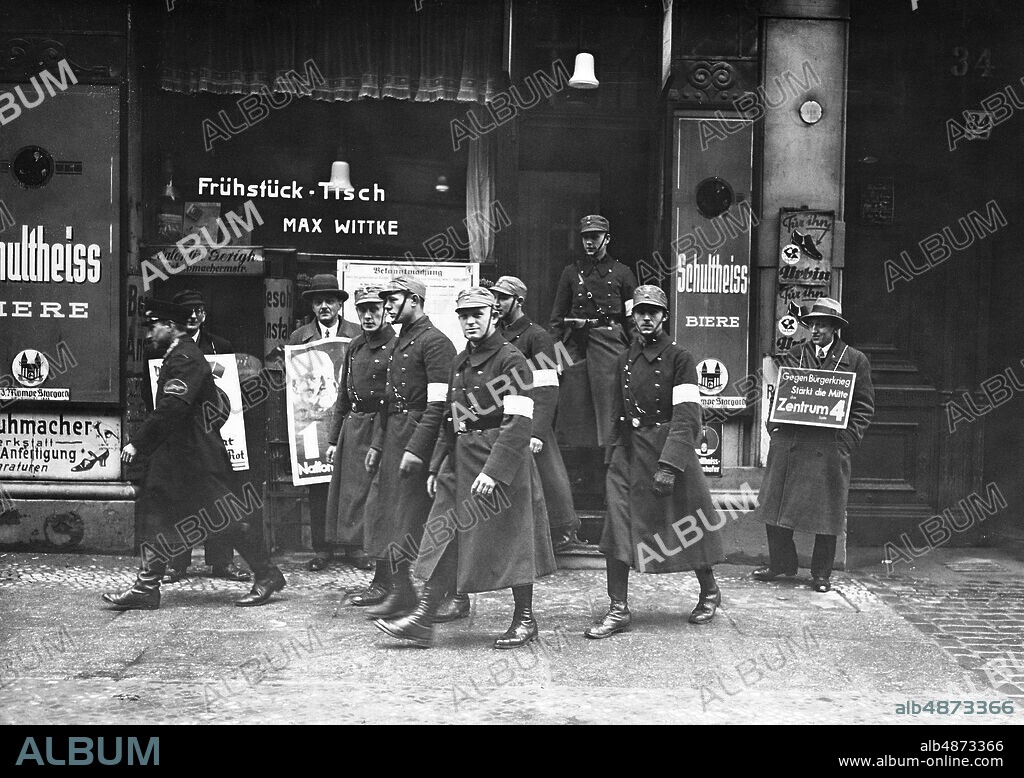GERMANY 1933-03-05. Orig. caption ... THE REICHSTAG ELECTION ON 5 MARCH IN SIGN OF THE NATIONAL RISE. 41995) Everyone went to the polls: S.A. Aid Police upon leaving their polling station. Photo: Robert Sennecke / AB Text & Bilder / SVT / Code: 5600 Folder: German parliamentary elections 5 March 1933 1495 C Election campaigns SA, Nazi German Confederation founded 1921 sites: GERMANY.